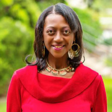 Portrait of Michelle Simms with nature background